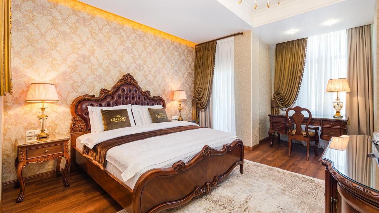Gregory Boutique Hotel Kisinyov Kültér fotó A bedroom in the hotel