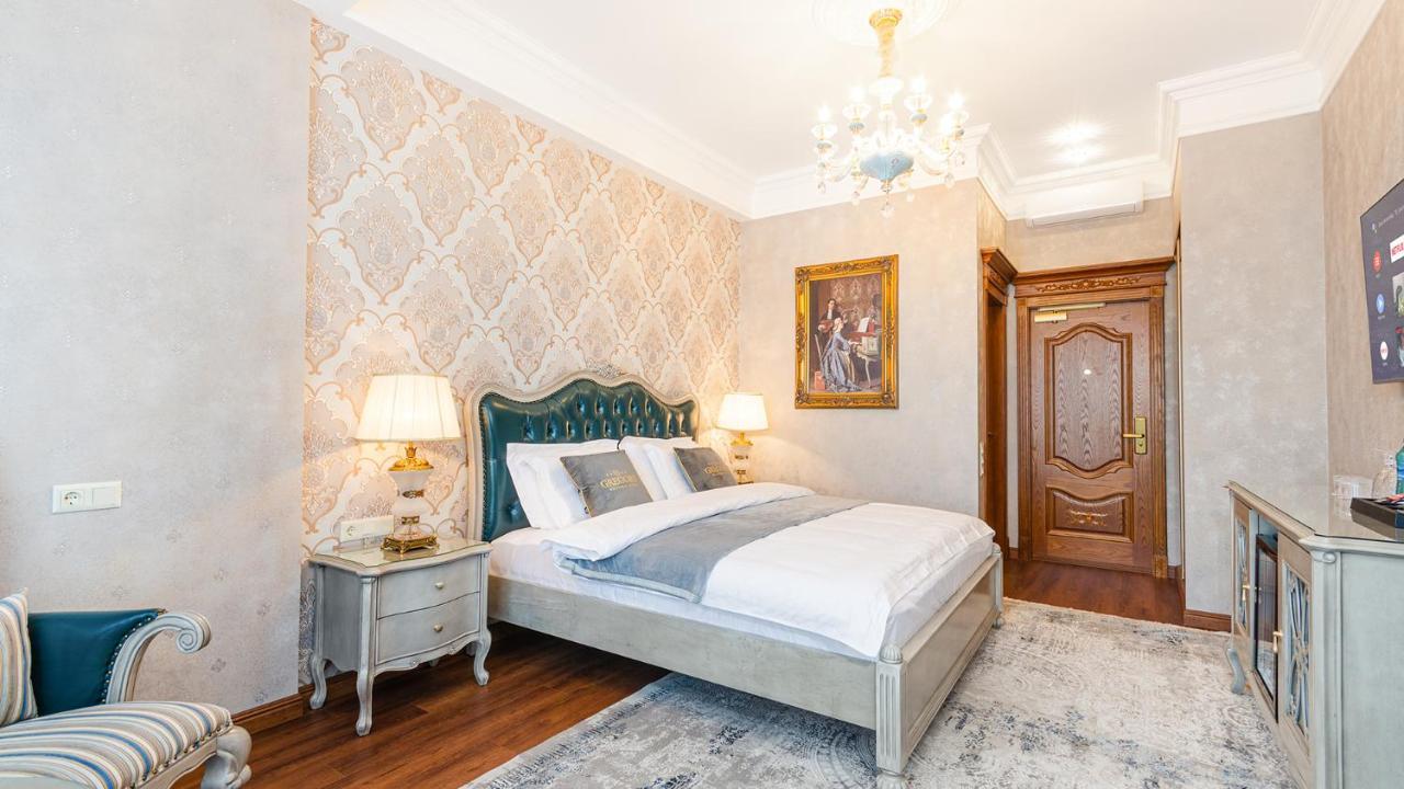 Gregory Boutique Hotel Kisinyov Kültér fotó A bedroom